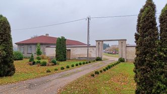 Former Pužai Post Office Station