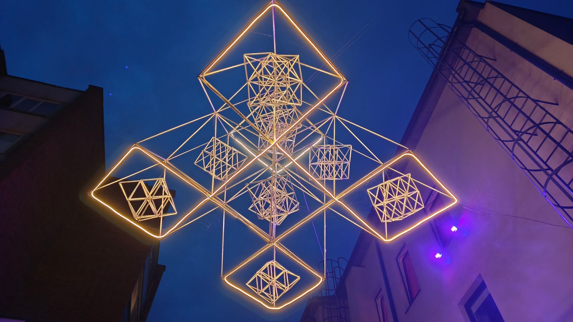 Illuminated metal straw mobile
