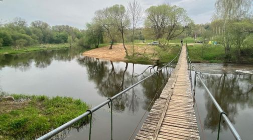 Ariogalos dainų slėnio kabantis tiltas per Dubysą